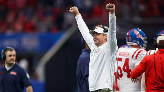 Ole Miss coach Lane Kiffin celebrates during the Peach Bowl.